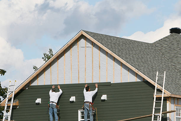 Professional Storm Damage Siding Repair technician working in Hamilton, GA